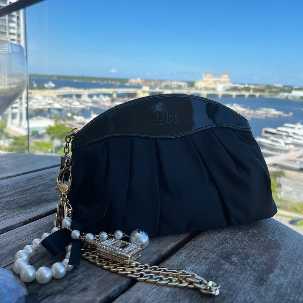 Dior cosmetic bag repurposed into wristlet with gold, pearls, keychain & charm.